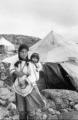 1215-photo-Young-Inuit-girl-carrying-a-baby-in-her-amauti-hood_g